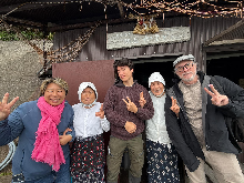 A family traveling with two local hosts